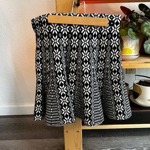 Black and white floral mini tulip skirt